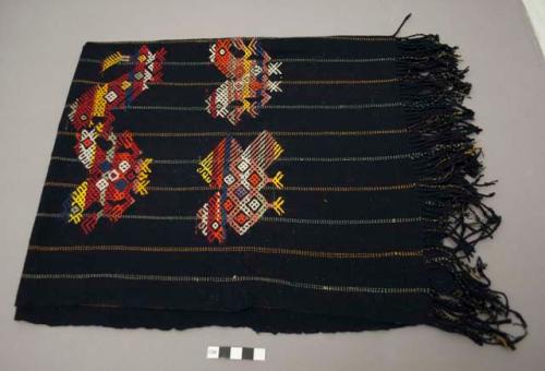 Tzute, dark indigo, thin stripes, twisted fringe, brocade of brightly colored animal figures