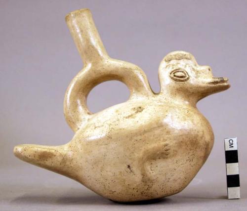 Pottery jar mouth in center of cross handle, bird on side, white