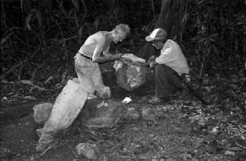 Ian Graham and Anatolio epoxying altar fragments at La Corona