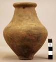 1 small pottery vessel with consricted mouth and small base