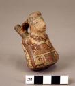 Late Nasca miniature bottle with a male warrior and trophy heads