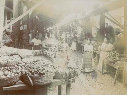 Central market scene, people look towards camera