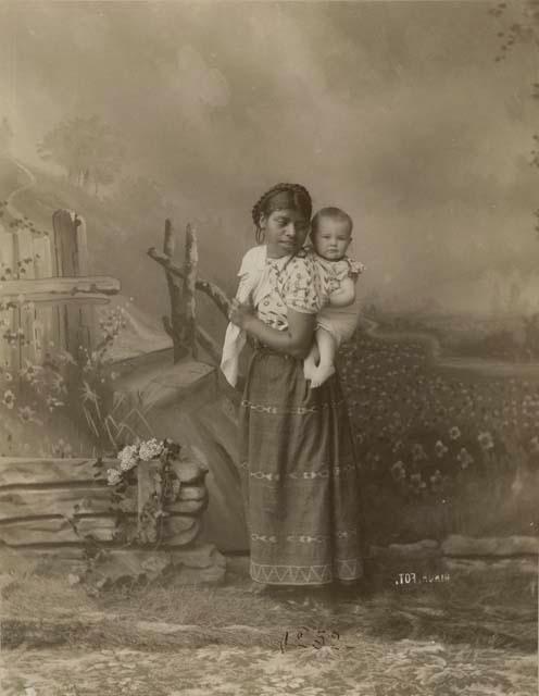 Studio portrait of Maya woman and white baby --  "Indian Nurse"