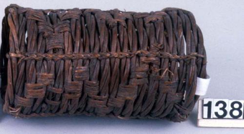 Cuff made of coils of vine.