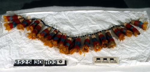 Pendant with tufts of wakamaiyu feathers