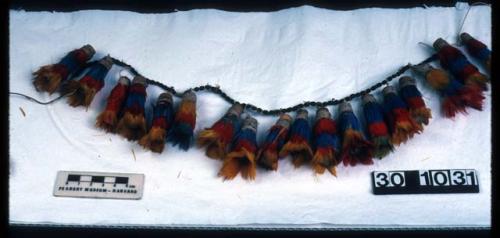 Pendant with tufts of wakamaiyu feathers