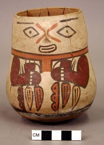 Ceramic effigy jar, polychrome painted face and body, molded nose