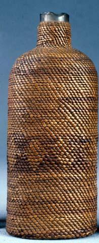 Bottle encased in basketry