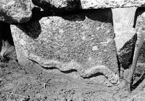 Highland on Lake Titicaca, stone with snake design