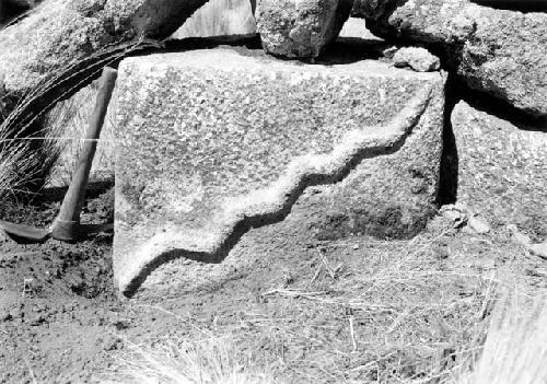 Highland on Lake Titicaca, stone with snake design