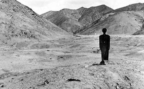 Highland on Lake Titicaca, iron scarecrow in mountains