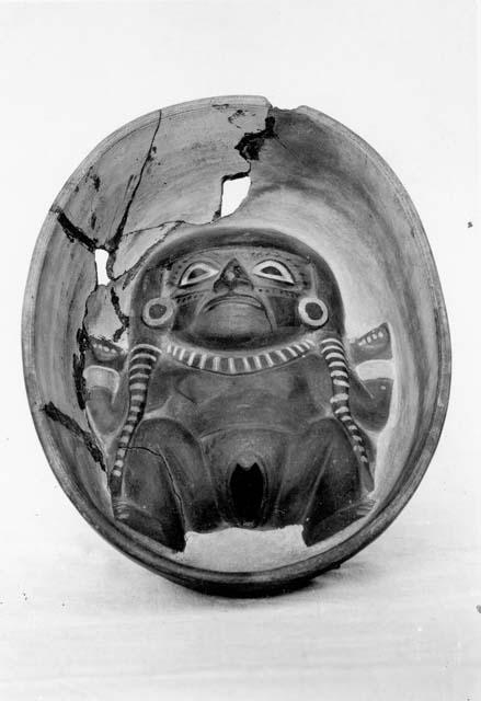 Ceramic bowl with male human figure in interior