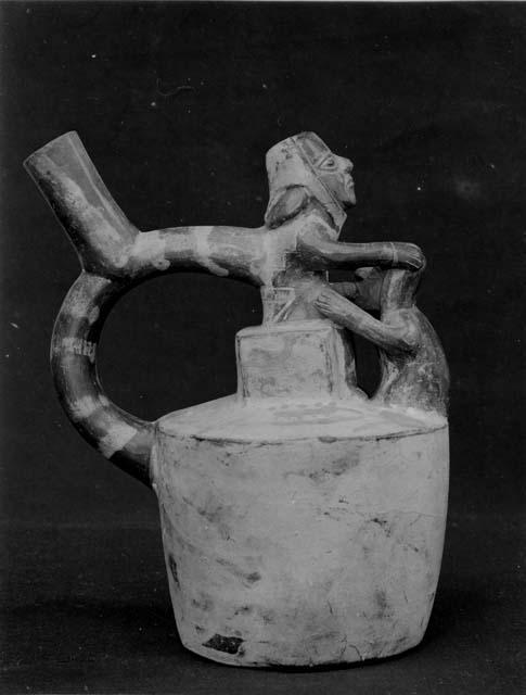 Ceramic vessel with figures engaged in a sexual act