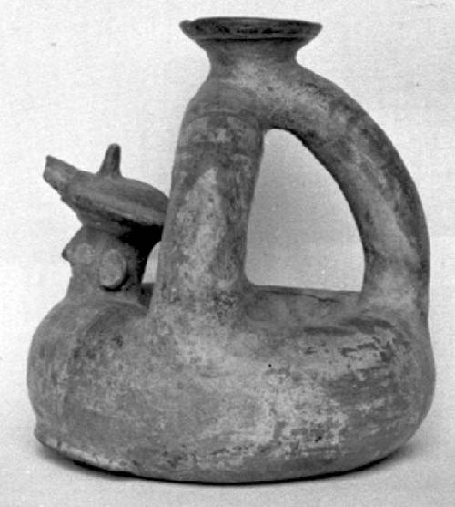 Calleju du Higlas Pottery, decorated jar with long double neck and human head