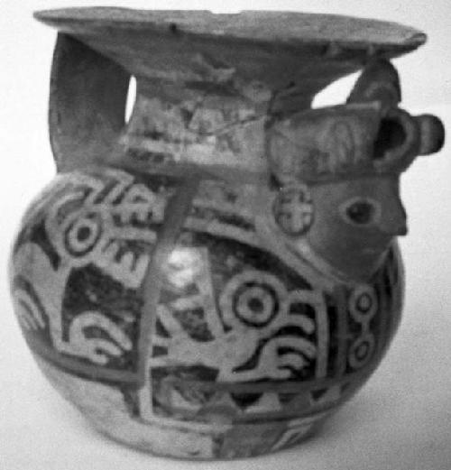 Calleju du Higlas Pottery, decorated jar with handle and human face