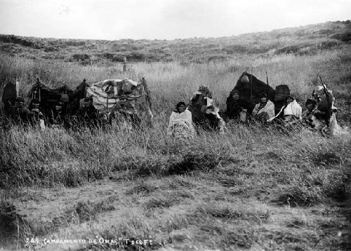 Onas camped behind a wind break