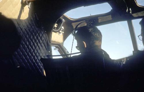 Two men flying a plane