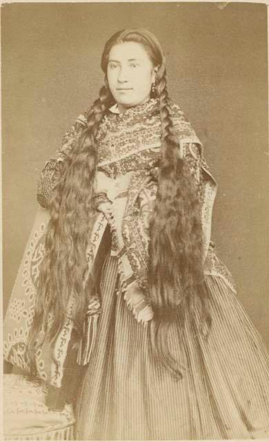 Portrait of woman with long braids