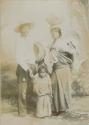 Studio portrait of man, woman and two young children