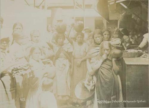 Women and pottery inside the Central Market