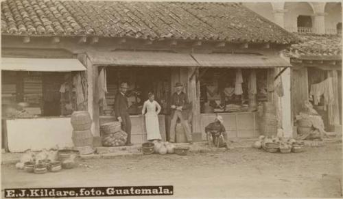 People outside a storefront