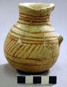Small san bernardino black-on-yellow pottery jar