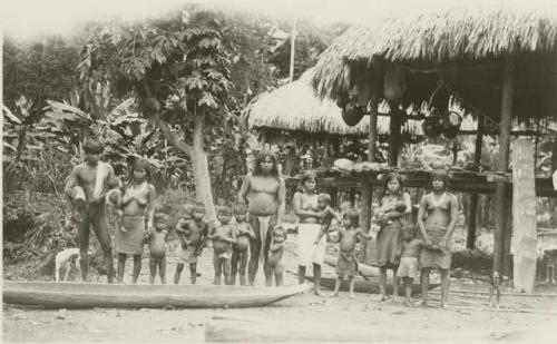 Group photo of men, women and many children