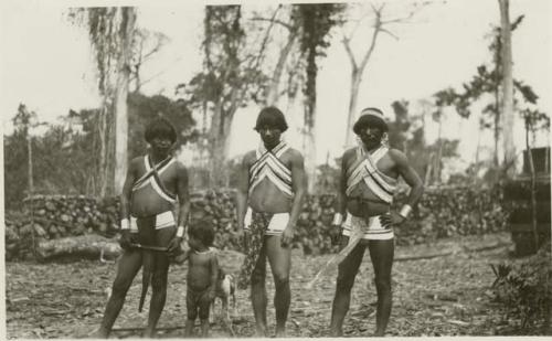 Group photo of men, women and many children