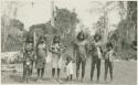 Group photo of men, women and many children