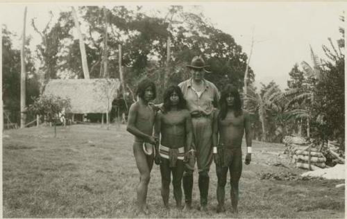 Three Chocó men and an expedition member