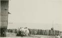 Men crowded around boat