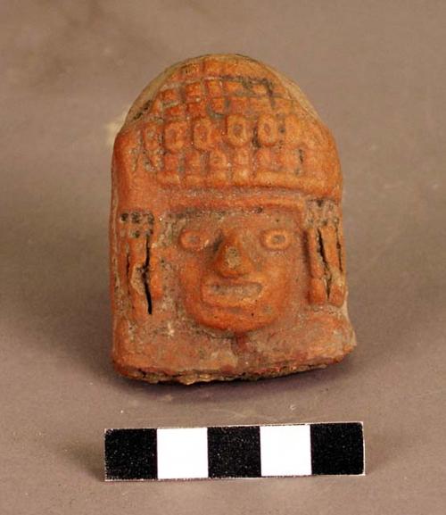 Ceramic head, broken from larger effigy, incised