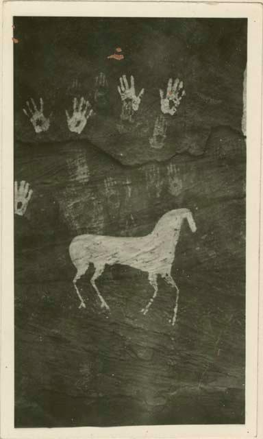 Pictograph of horse and hand prints made with same paint