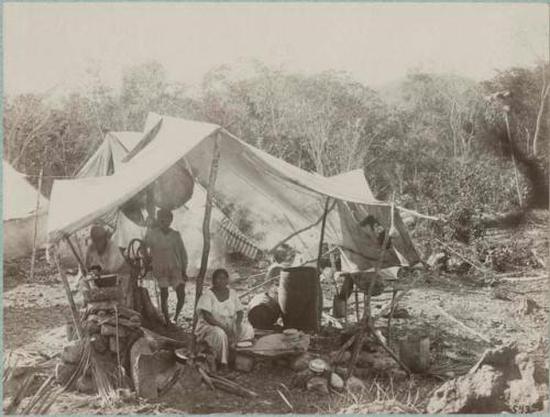 Native Maya people in cooking tent