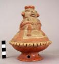 Pottery effigy vessel - partial reddish brown slip with cream geometric design o