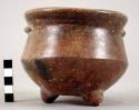 Fine incised black-brown ware vessel - restored