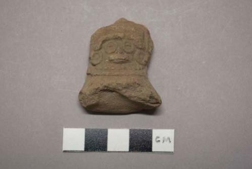 Pottery head with headdresses