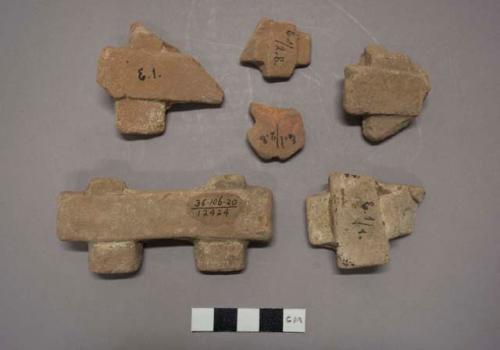 Pottery throne fragments.