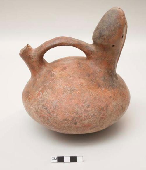 Effigy vessel, phallic; loss to spout; restored