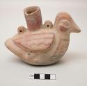 Effigy vessel, molded and painted bird with spout, perforated for hanging; cracked