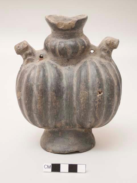 Effigy vessel, double lobed squash with 2 zoomorphs, perforations, flaring rim, anular base