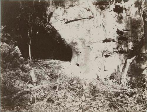 Sculptured figure (bas-relief) at one entrance to the cave