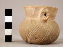 Ceramic minature jar, incised, dimple base, spout broken off