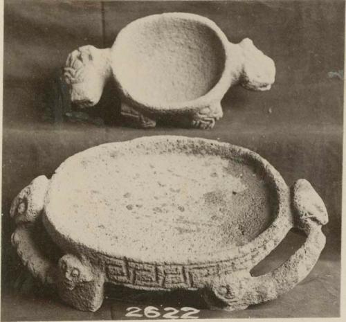 Two carved stone bowls