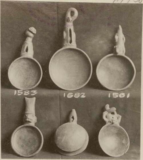 Pottery dishes with effigy handles