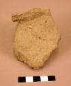 Ground stone fragment, worked