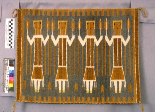 Pictorial rug with four yei figures