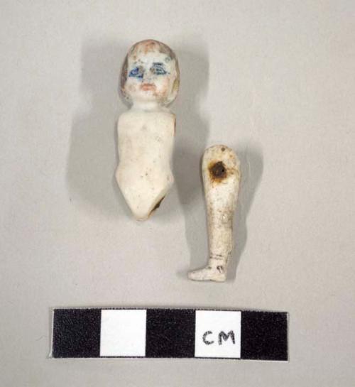 Doll fragments - one bisqued left leg, and one torso and head