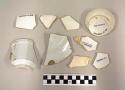 Miscellaneous white china sherds, including cup bases, plate bases, rims and bod