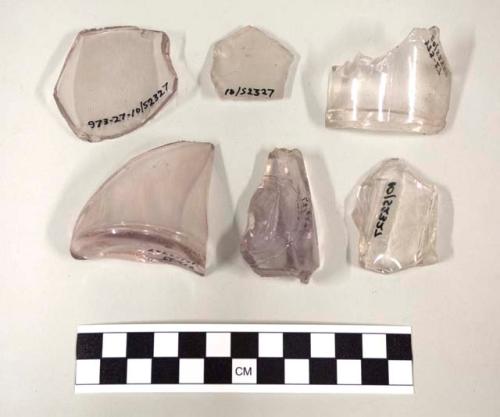 Clear body glass (purpled) base and body fragments